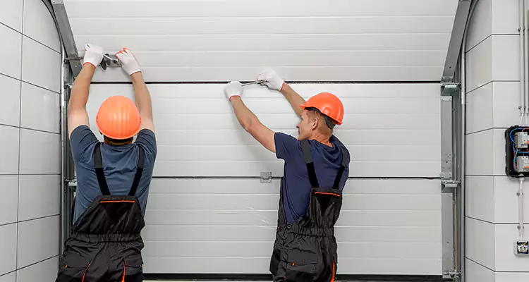 Garage Door Bottom Panel Repair in Palm Bay, FL
